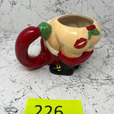 Kiss My ___ Santa Mug