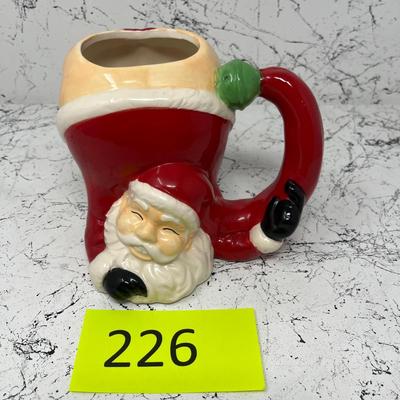 Kiss My ___ Santa Mug