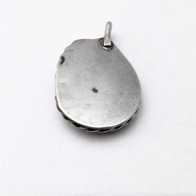 Lot #47  Southwest style Sterling Silver & Turquoise Pendant