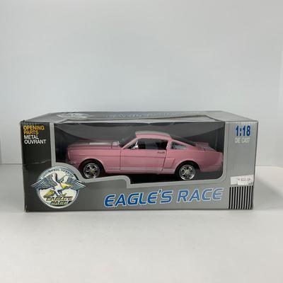 -143- CAR | Universal Hobbies Eagles Race 1966 Ford Mustang Fastback Pink 1:18 Scale