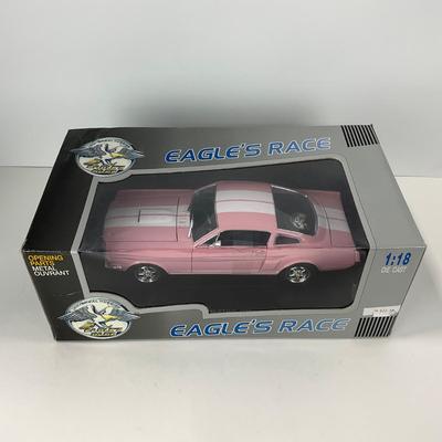 -143- CAR | Universal Hobbies Eagles Race 1966 Ford Mustang Fastback Pink 1:18 Scale