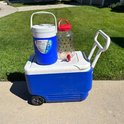 COOLER ON WHEELS, BEVERAGE COOLER AND A SUN TEA CONTAINER