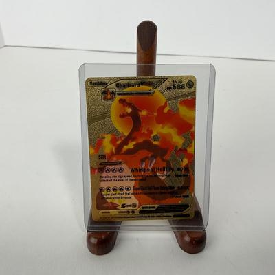 -173- POKÃ‰MON | Gold Foil Charizard Card