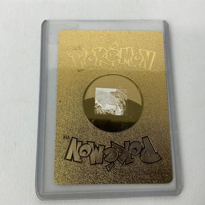 -173- POKÃ‰MON | Gold Foil Charizard Card