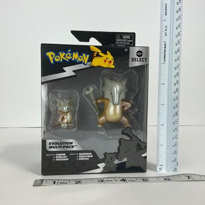 -177- POKÃ‰MON | Cuebone Figures & PokÃ©mon Sword & Shield Book
