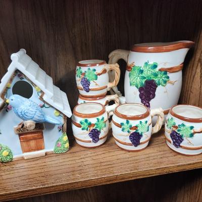 Porcelain birdhouse and grape tea set