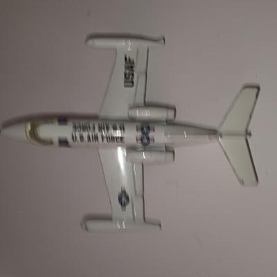 Three vintage metal airplanes and one British airlines model