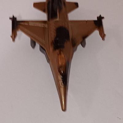 Three vintage die cast planes and a plastic Blimp