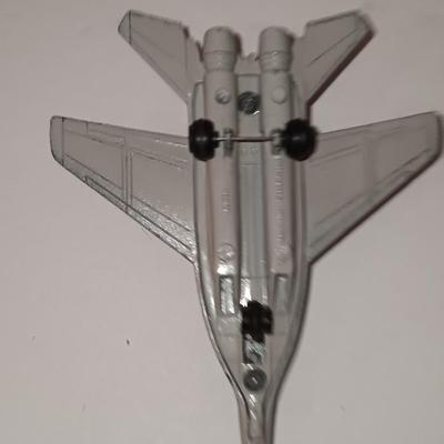 Three vintage die cast planes and a plastic Blimp
