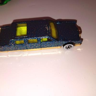 Die cast Matchbox and Hot wheels glitter Limo - Official race car and others