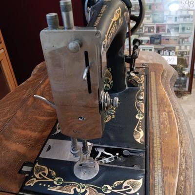 Beautiful complete, Antique The Free Sewing treadle machine Working! With accessories