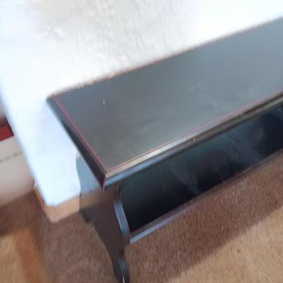Small black two tiered shelf