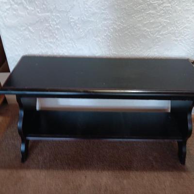 Small black two tiered shelf