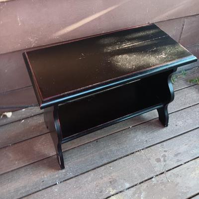 Small black two tiered shelf