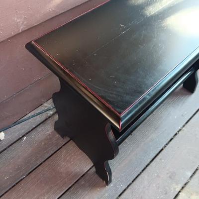 Small black two tiered shelf
