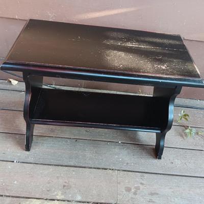 Small black two tiered shelf