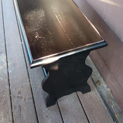 Small black two tiered shelf