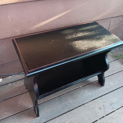 Small black two tiered shelf
