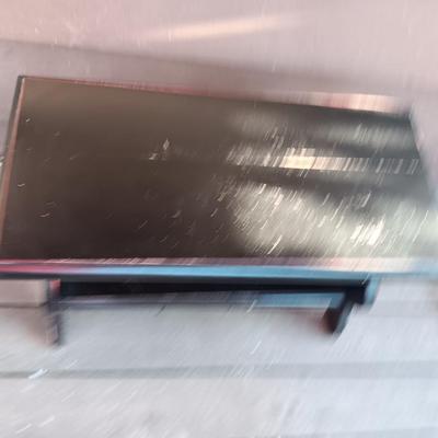Small black two tiered shelf