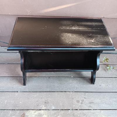 Small black two tiered shelf