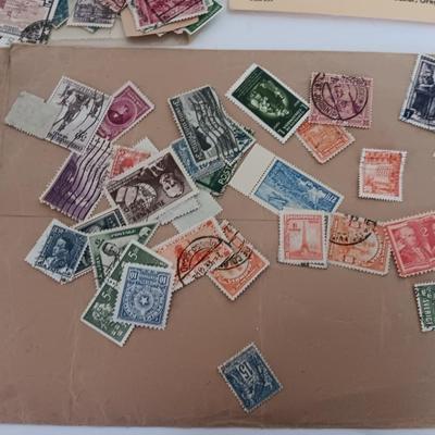 The Stamp book with stamps - and extra loose stamps too Postage stamp collection