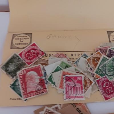The Stamp book with stamps - and extra loose stamps too Postage stamp collection