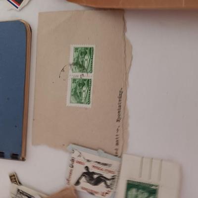 The Stamp book with stamps - and extra loose stamps too Postage stamp collection
