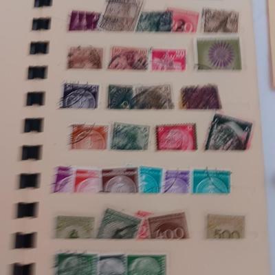 The Stamp book with stamps - and extra loose stamps too Postage stamp collection