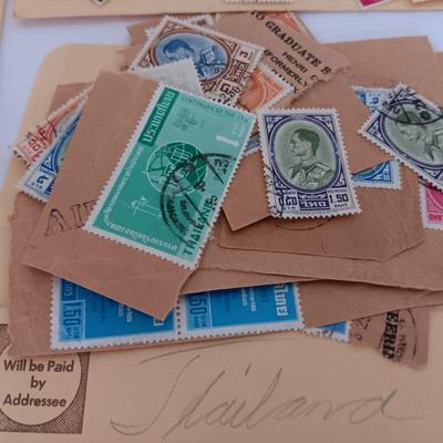 The Stamp book with stamps - and extra loose stamps too Postage stamp collection