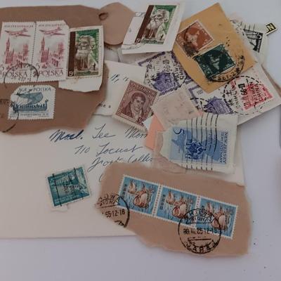 The Stamp book with stamps - and extra loose stamps too Postage stamp collection