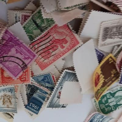 Who spilled the stamps?! Postage stamps galore! Stamp collecting