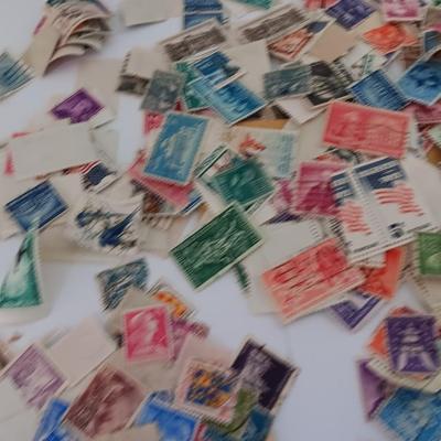 Who spilled the stamps?! Postage stamps galore! Stamp collecting