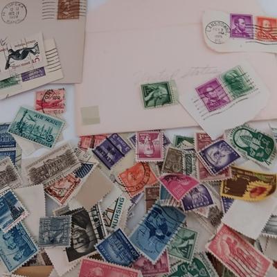Who spilled the stamps?! Postage stamps galore! Stamp collecting