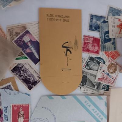 Who spilled the stamps?! Postage stamps galore! Stamp collecting