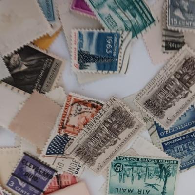 Who spilled the stamps?! Postage stamps galore! Stamp collecting