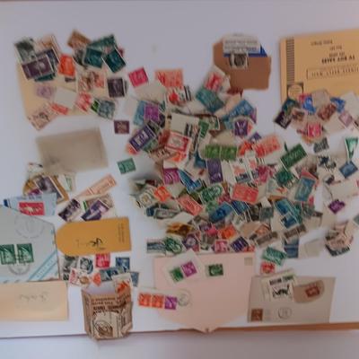 Who spilled the stamps?! Postage stamps galore! Stamp collecting