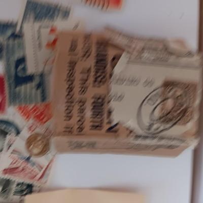 Who spilled the stamps?! Postage stamps galore! Stamp collecting