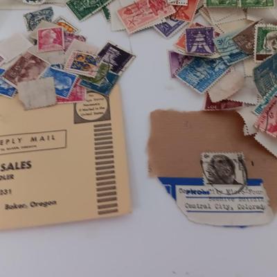Who spilled the stamps?! Postage stamps galore! Stamp collecting