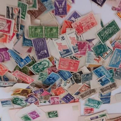 Who spilled the stamps?! Postage stamps galore! Stamp collecting