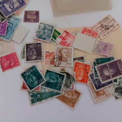 Who spilled the stamps?! Postage stamps galore! Stamp collecting