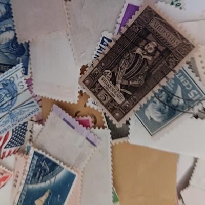 Who spilled the stamps?! Postage stamps galore! Stamp collecting