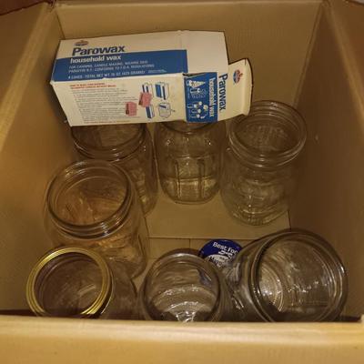Canning Jars with assortment of lids and other items