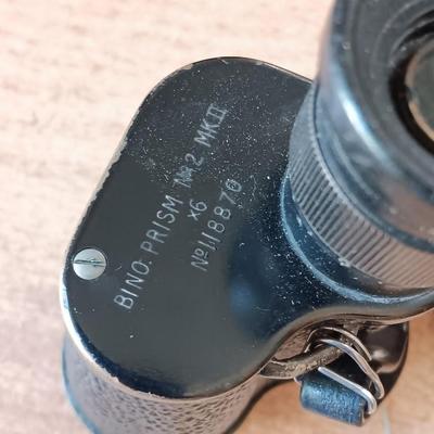 A Pair of WWII Military issued field Binoculars BY KERSHAW. DATED 1942