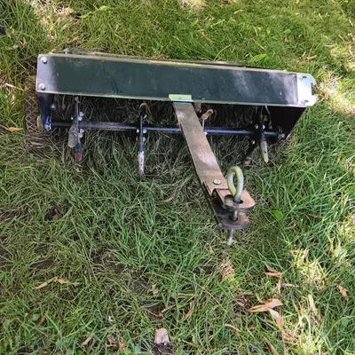 Craftsmen pull behind mower / 4-wheeler Aerator.