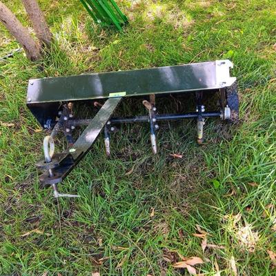 Craftsmen pull behind mower / 4-wheeler Aerator.