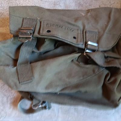 Fishing lures with green canvas military bag