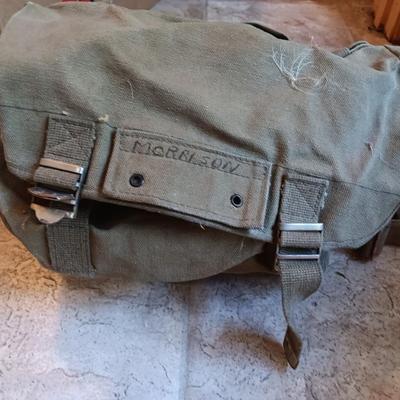 Fishing lures with green canvas military bag