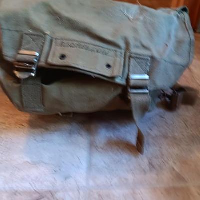 Fishing lures with green canvas military bag