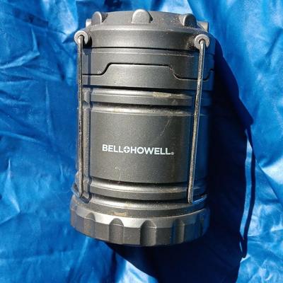 "Mummy bag" sleeping bag with cover and a Bell Howell lantern