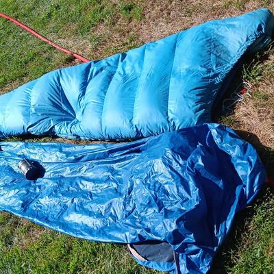 "Mummy bag" sleeping bag with cover and a Bell Howell lantern